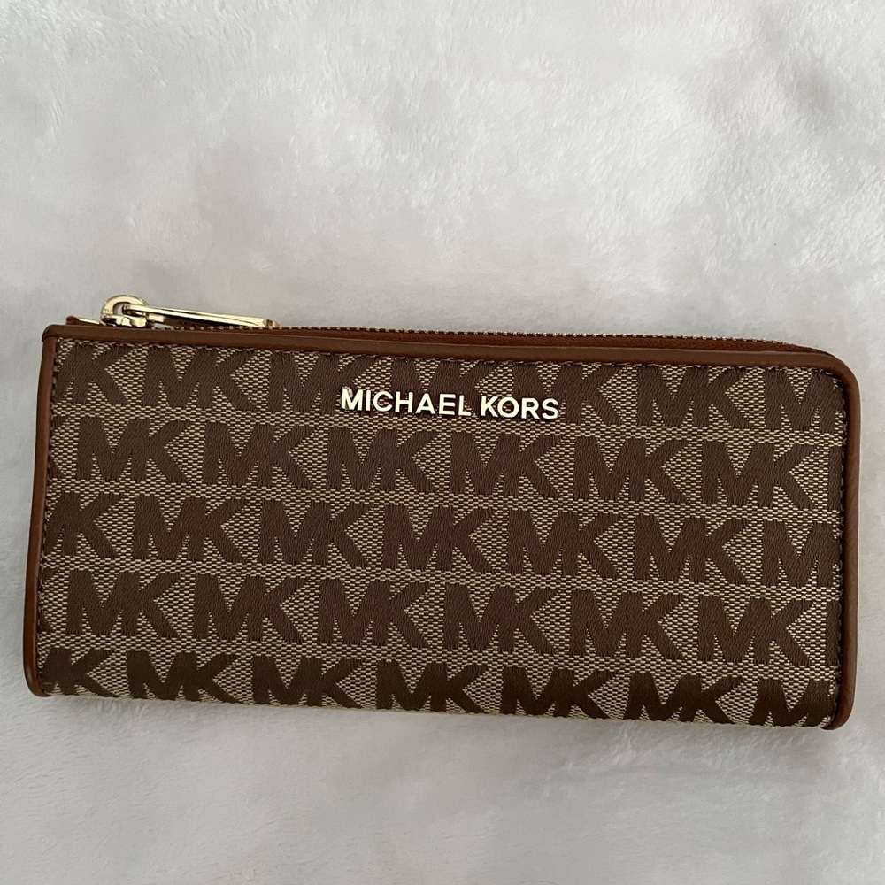Michael Kors Signature Canvas wallet.